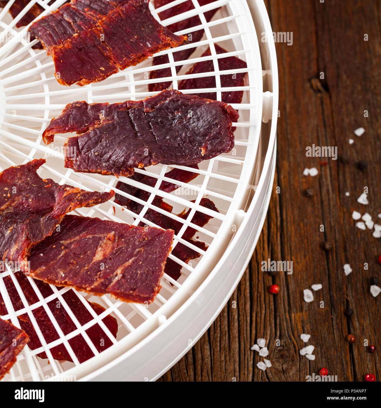 Homemade Beef Jerky in a Dehydrator Stock Photo Alamy