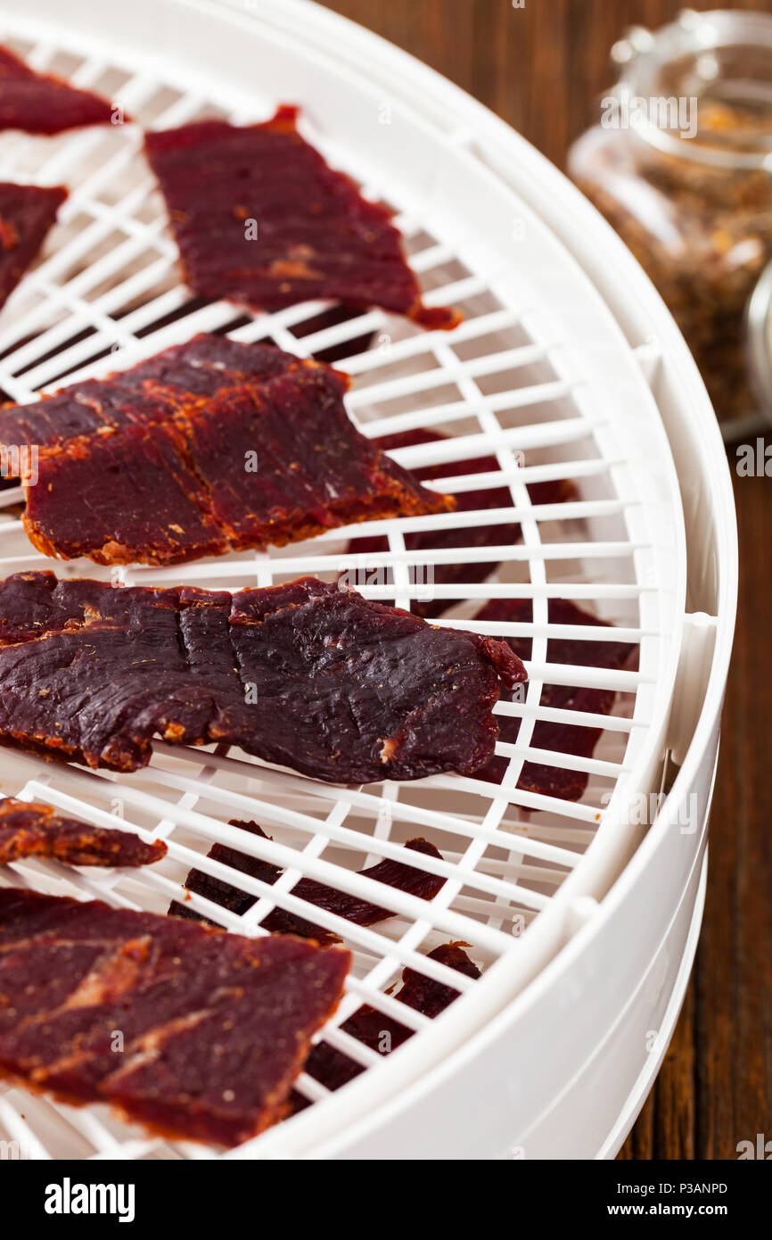 Homemade Beef Jerky in a Dehydrator Stock Photo Alamy