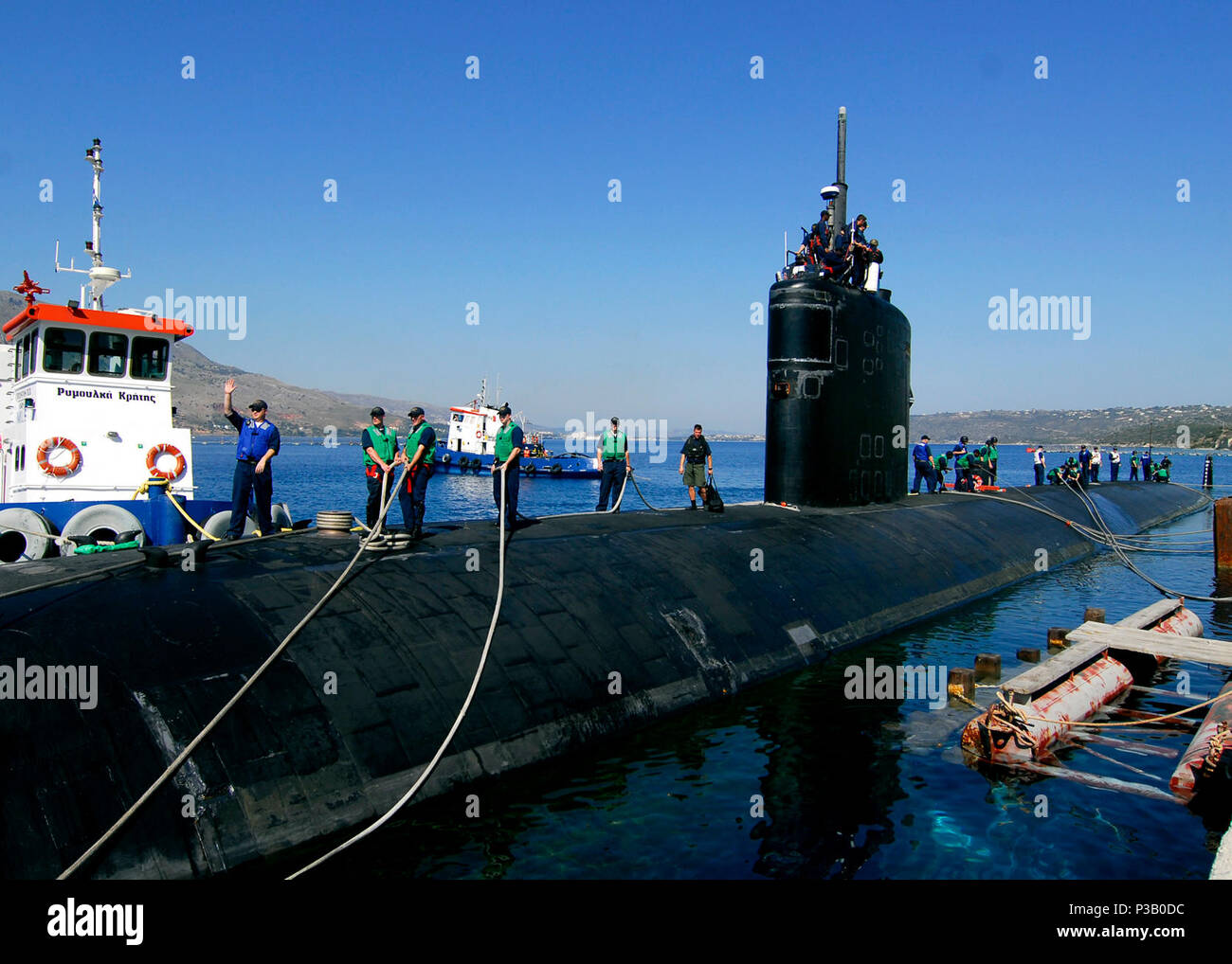 BAY, Crete (June 11, 2008) Sailors conduct mooring operations as the fast-attack submarine USS Albany (SSN 753) arrives in Souda Bay for a routine port visit. Albany is on a scheduled six-month deployment as part of the NASSAU Expeditionary Strike Group operating in the U.S. 6th Fleet area of responsibility supporting maritime security operations. U.S. Navy Stock Photo