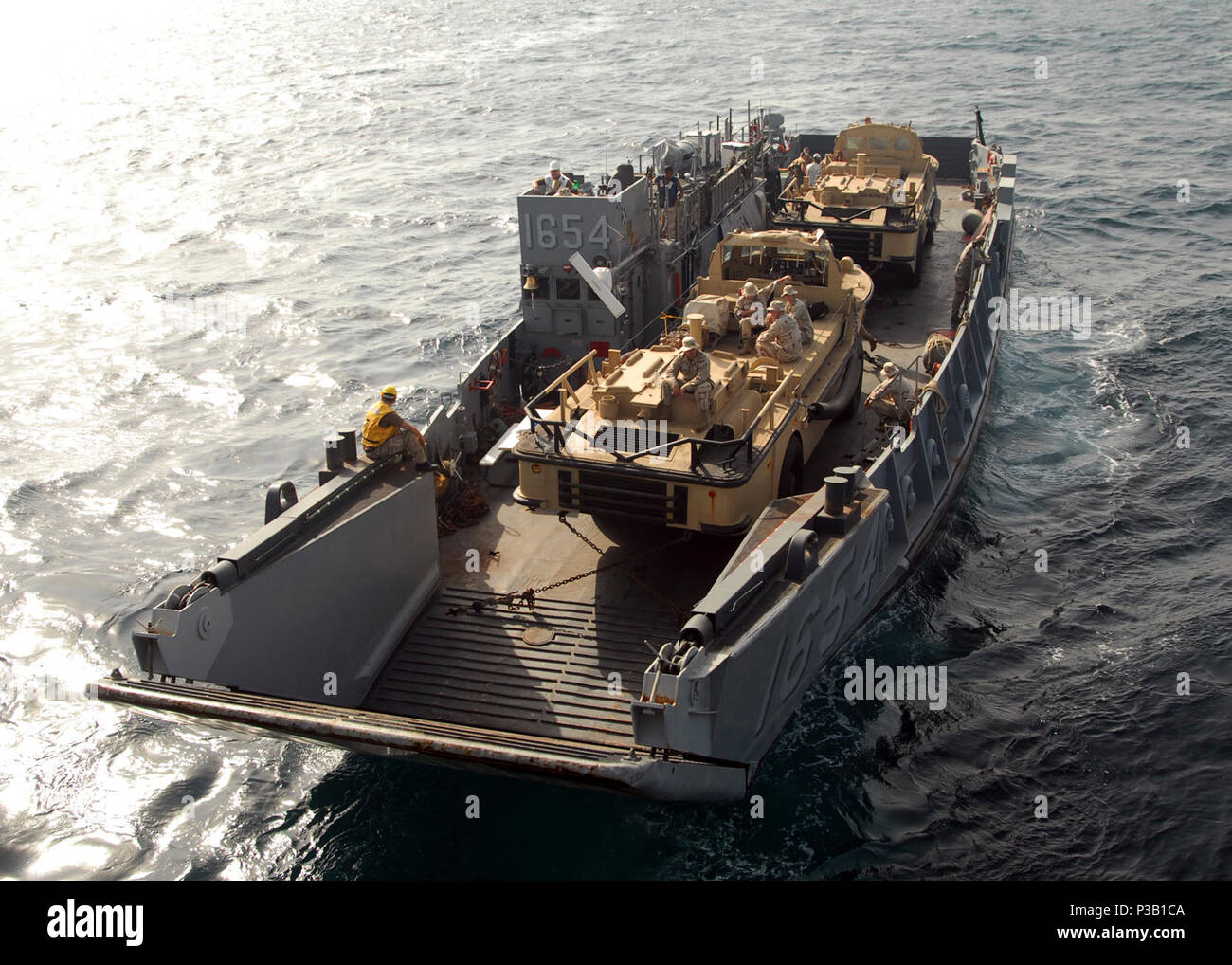 GULF (Oct. 18, 2008) A landing craft utility assigned to Assault Craft Unit (ACU) 4 disembarks from the amphibious dock landing ship USS Carter Hall (LSD 50) to conduct amphibious operations. Carter Hall is deployed as part of the Iwo Jima Expeditionary Strike Group supporting maritime security operations in the U.S. 5th Fleet area of responsibility. Stock Photo