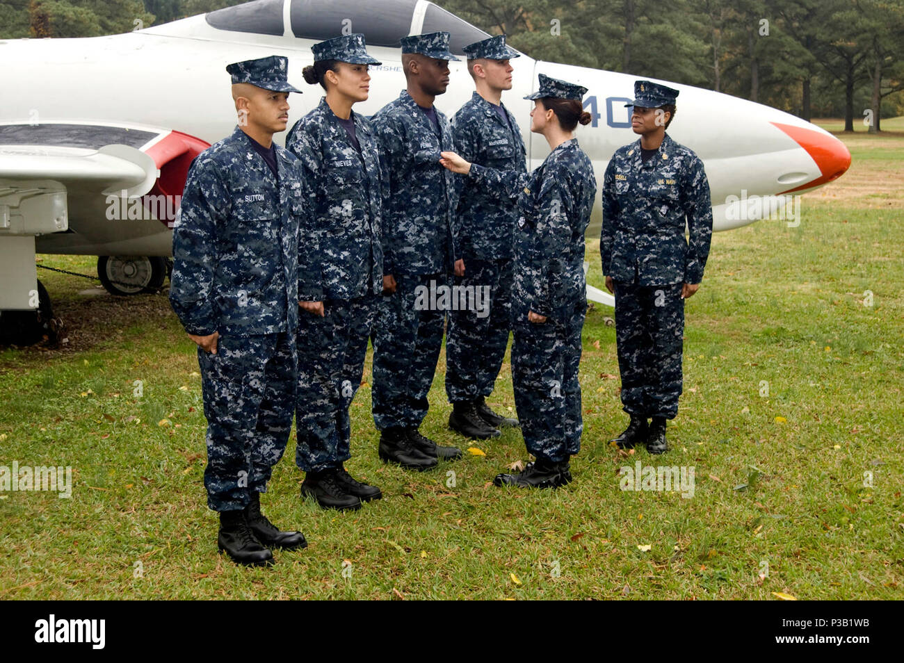 Va. (Nov. 7, 2008) Sailors wear the Navy working uniform (NWU) at Naval Air Station Oceana. The NWU is intended for year-round wear and will be the standard working uniform ashore by October 2010. The NWU will replace working utilities, tropical working uniforms, wash khakis, winter working blue, aviation working green, and non-tactical/environmental usage of camouflage utility uniforms. Unless otherwise prescribed by the regional commander, the NWU is authorized to be worn at all facilities on base. Stock Photo