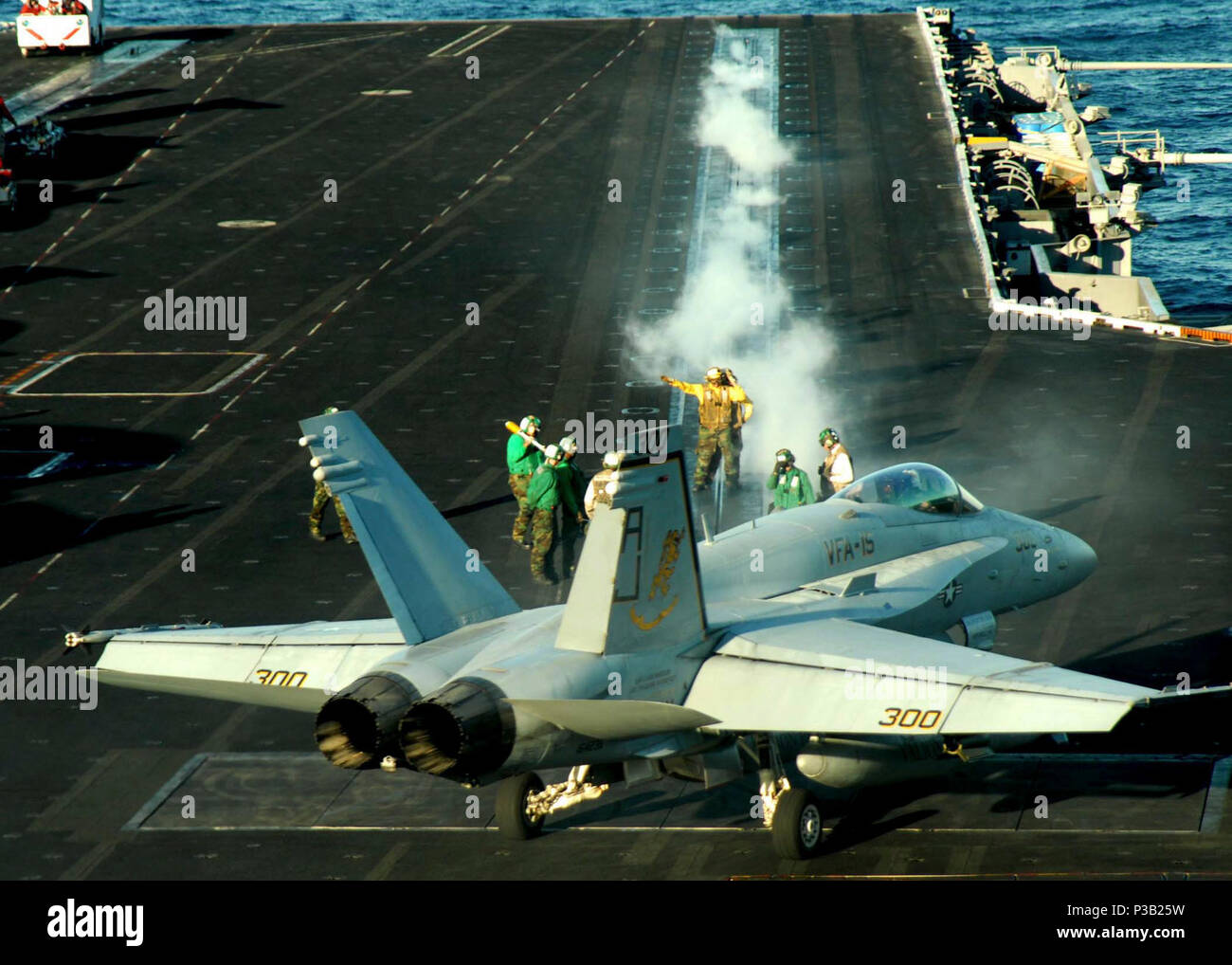 OF OMAN (Nov. 20, 2008) An F/A-18 Hornet assigned to the 'Valions' of Strike Fighter Squadron (VFA) 15 prepares to launch from the flight deck aboard the Nimitz-class aircraft carrier USS Theodore Roosevelt (CVN 71). Theodore Roosevelt and embarked Carrier Air Wing (CVW) 8 are on deployment in the U.S. 5th Fleet area of responsibility and are focused on reassuring regional partners of the United States commitment to security, which promotes stability and global prosperity. Stock Photo