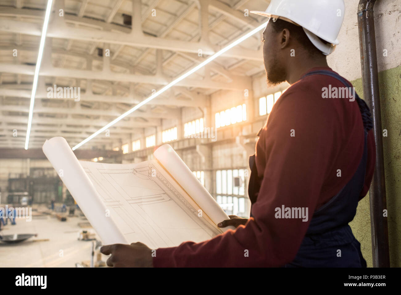 Pensive construction manager controlling building process Stock Photo