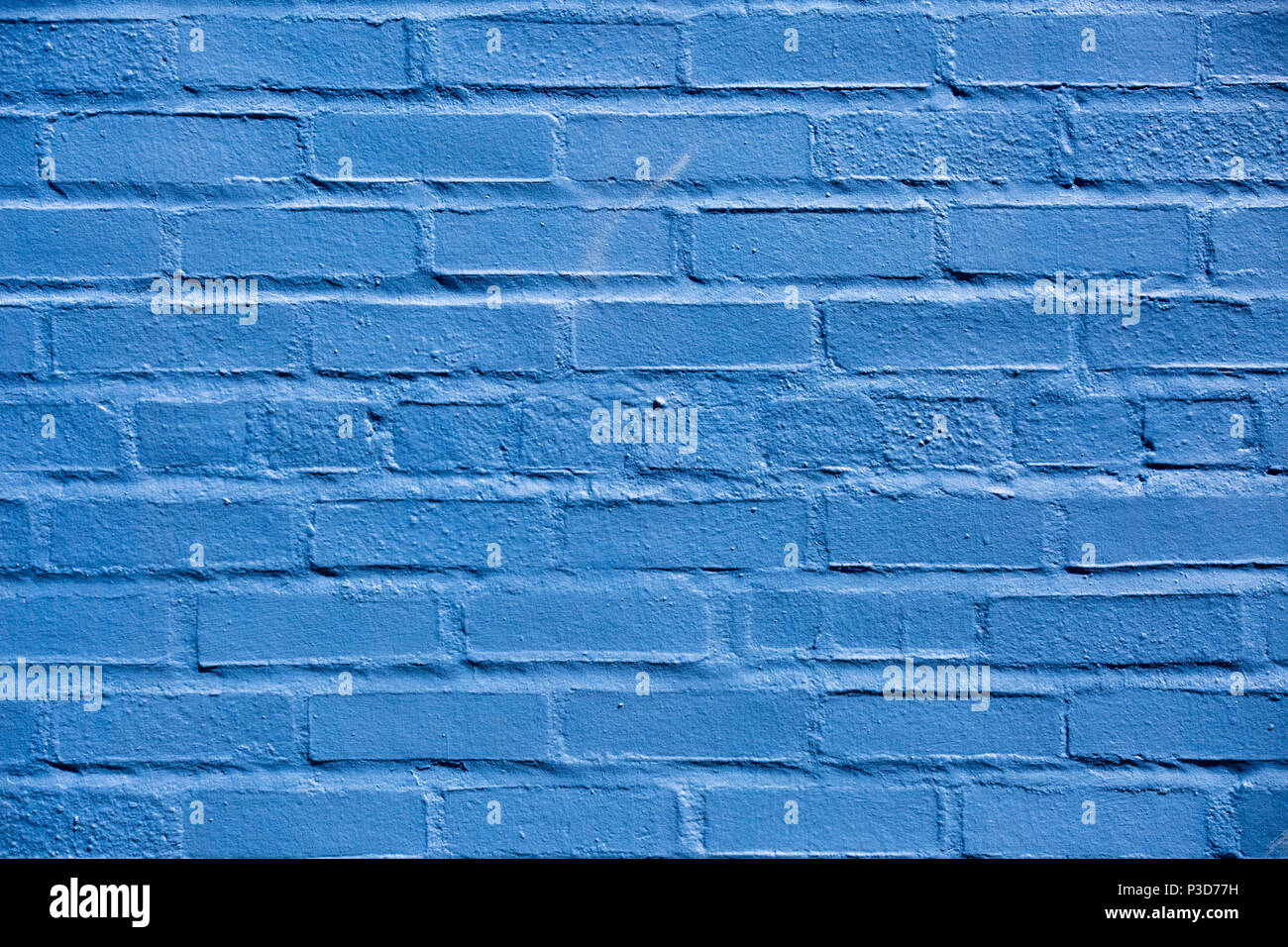 Brick wall painted blue in Warrenton Virginia, Stock Photo