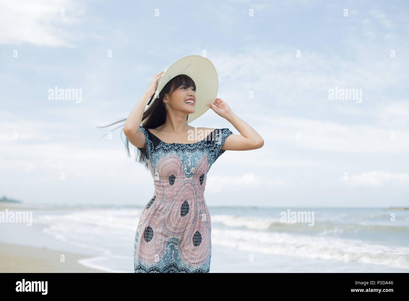 Thai girl enjoy and happy with her relaxing lifestyle in holiday, Thailand Stock Photo