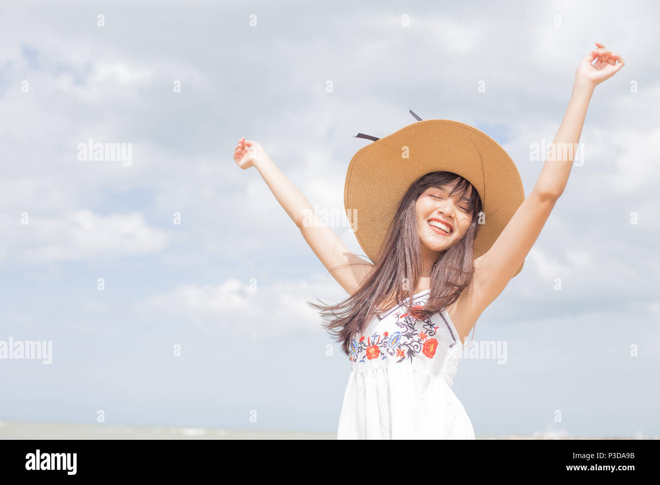 Thai girl enjoy and happy her relaxing on the beach, Hua Hin, Thailand Stock Photo