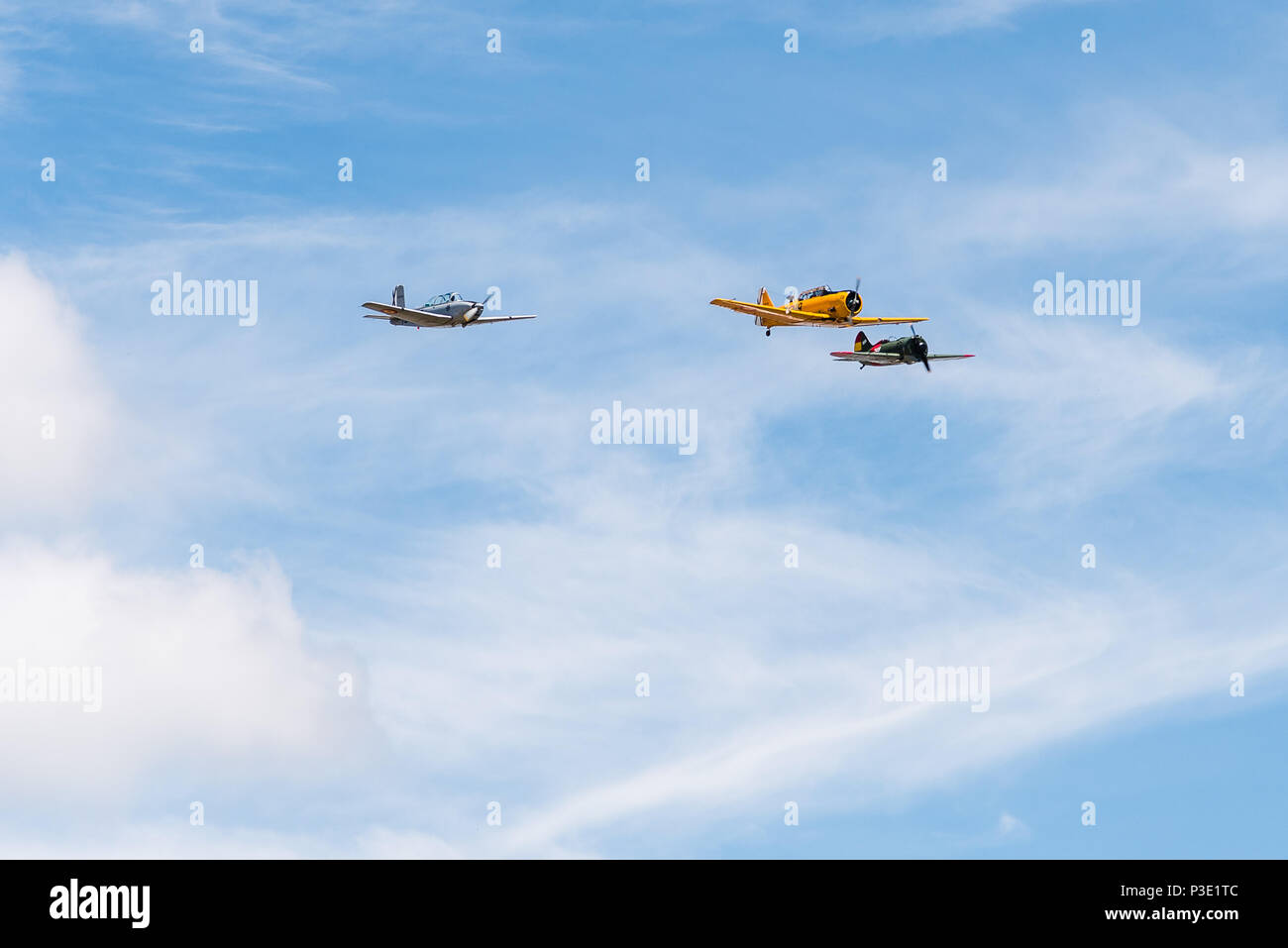 Madrid, Spain - June 3, 2018:  Formation flying of Policarpov I-16, North American T-6 Texan DUN and Beechcraft T-34A Mentor during air show of histor Stock Photo