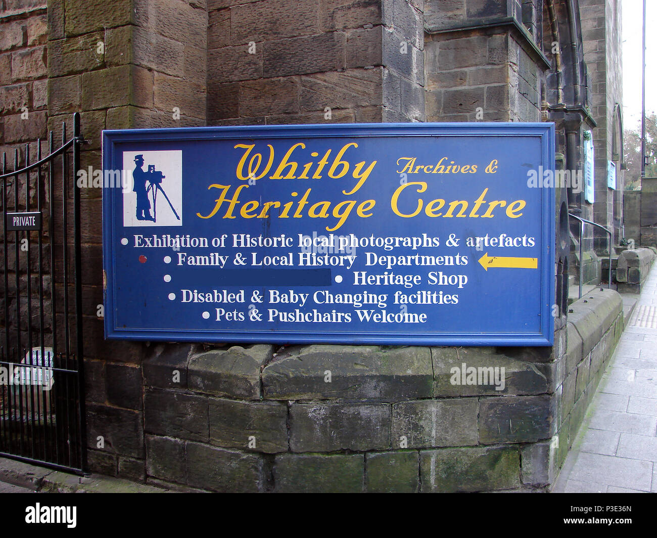 former signpost for Whitby Archives and Heritage Centre, Flowergate, North Yorkshire (Now defunct) Stock Photo