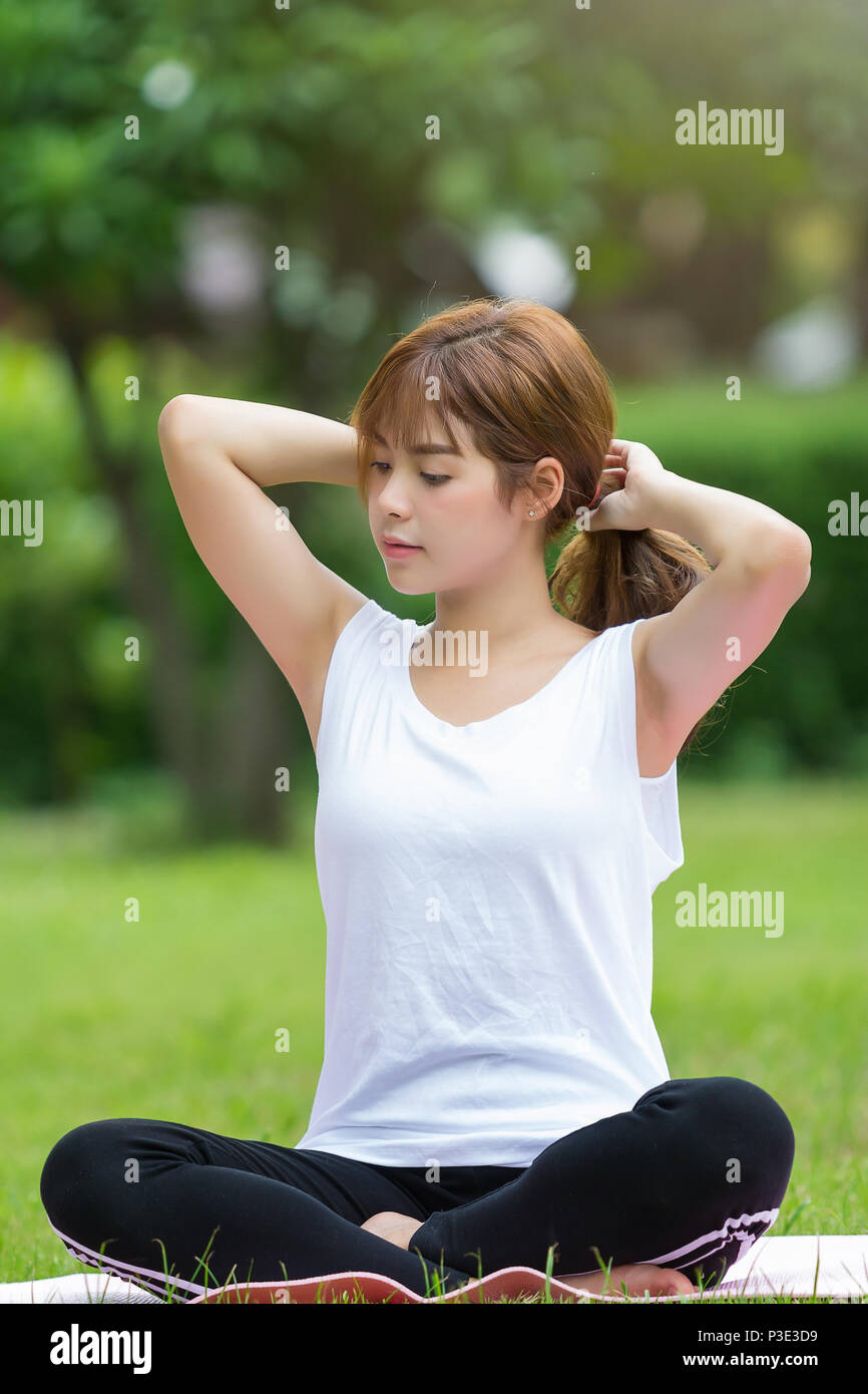 Beautiful asian women doing yoga hi-res stock photography and images ...