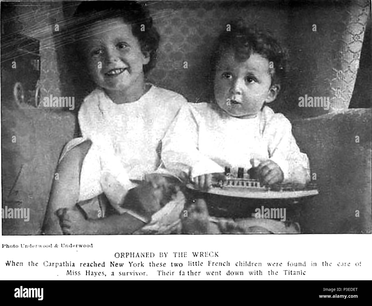 TITANIC - A 1912 newspaper photograph showing two French children orphaned by the Titanic disaster and saved by the Carpathia under the care of a Miss Hayes Stock Photo