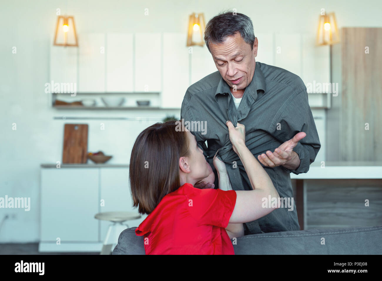 Angry furious wife having conflict with her husband Stock Photo