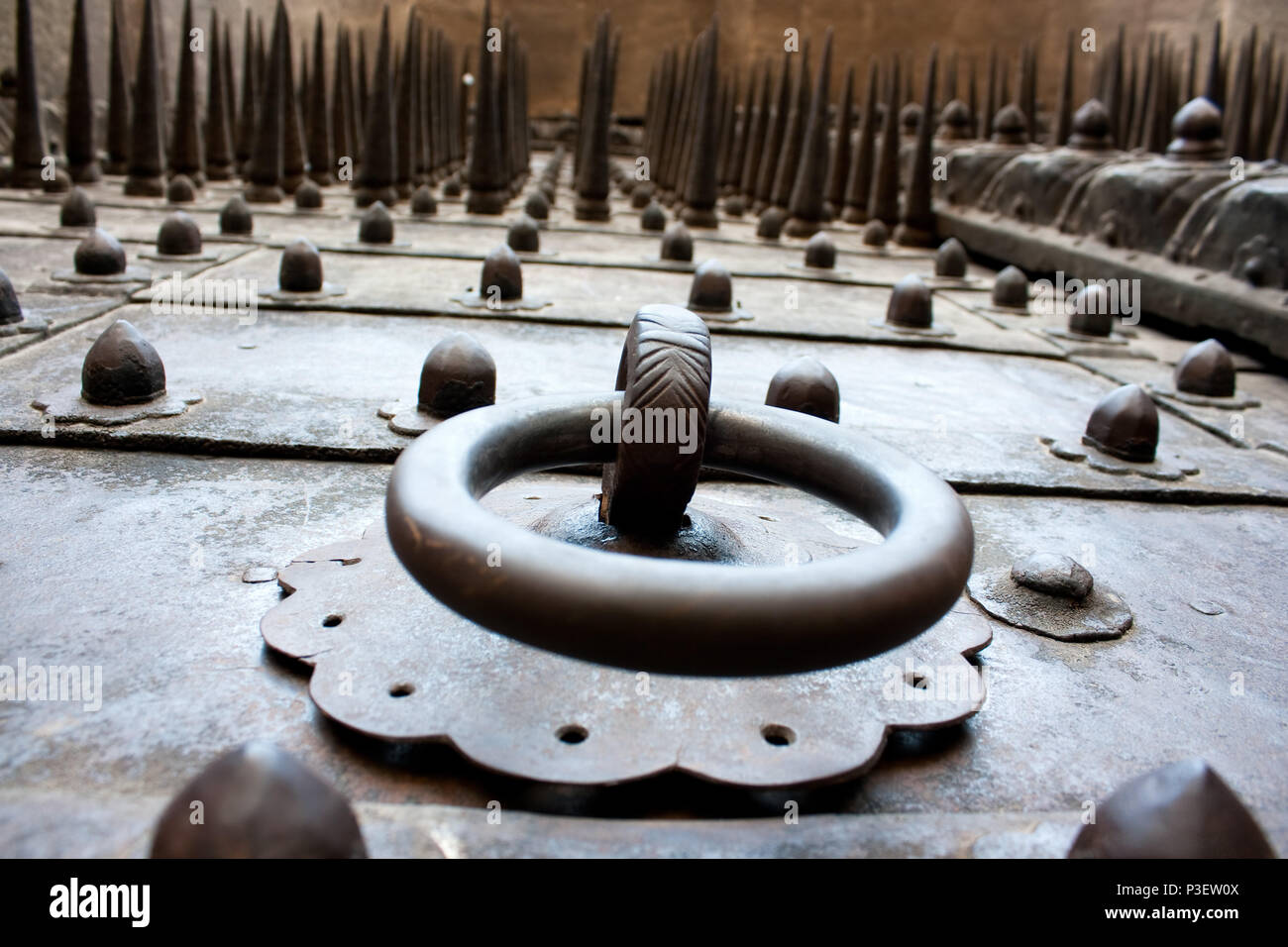 Door Handle on metal door with many sharps of Shaniwar Wada Palace, Pune, India Stock Photo Alamy