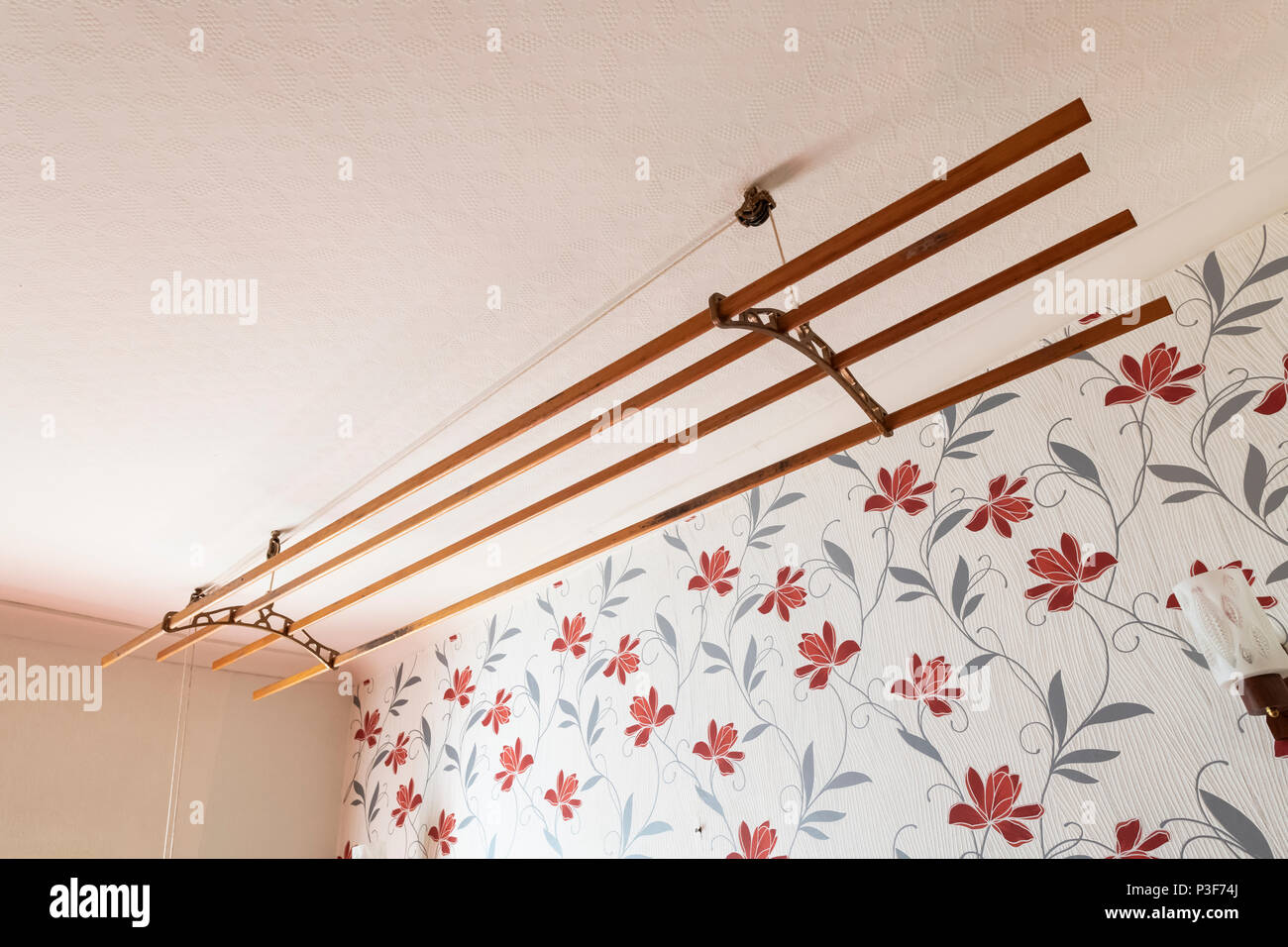 An old fashioned sheila maid (clothes airer) in a terraced house in the  north of England Stock Photo - Alamy