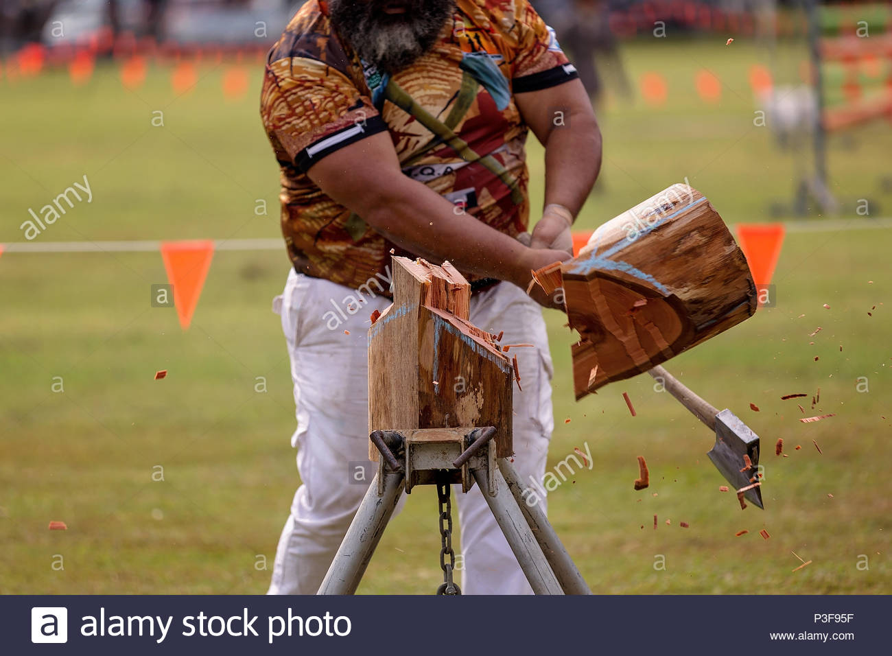 A Man Chopping Wood With An Axe Stock Photos & A Man Chopping Wood With
