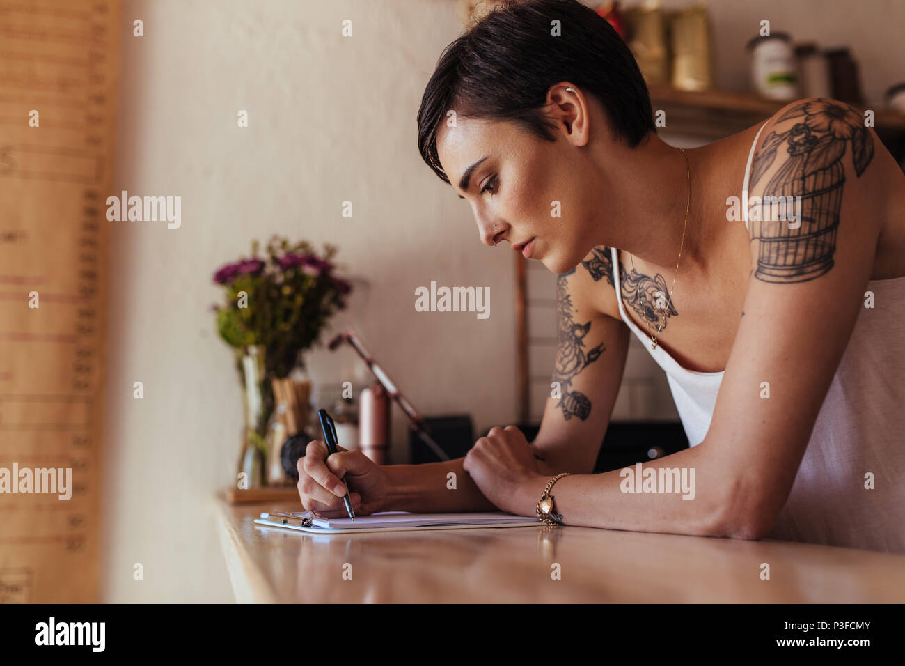 Female business woman tattoo hi-res stock photography and images - Alamy