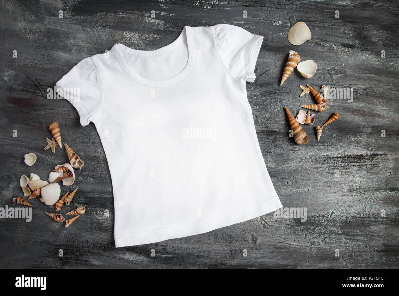 Baby white clothes on Black Wood for design template Stock Photo Alamy