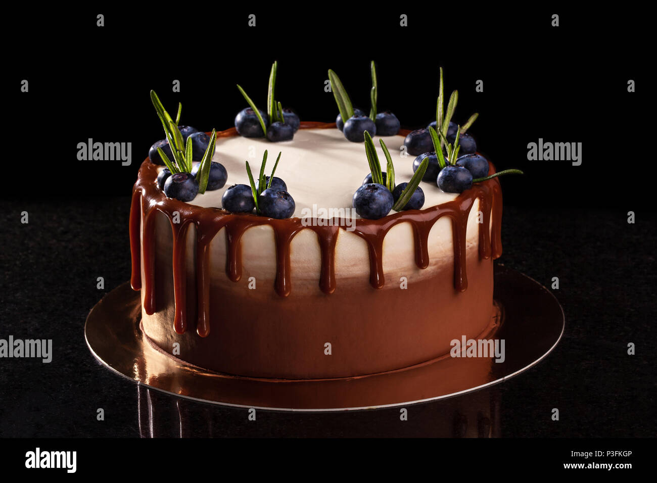 Chocolate Cake With Blueberries On A Black Background Decorated