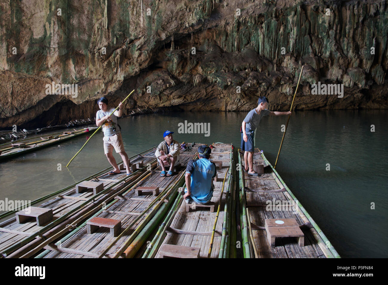 Bamboo rafts and raft men Tham Lod Caves Mae Hong Son Province Northern Thailand Stock Photo