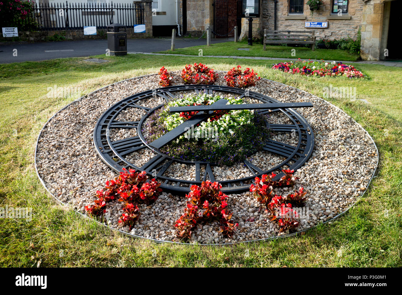Floral clock outside the Almonry Museum, Evesham, Worcestershire