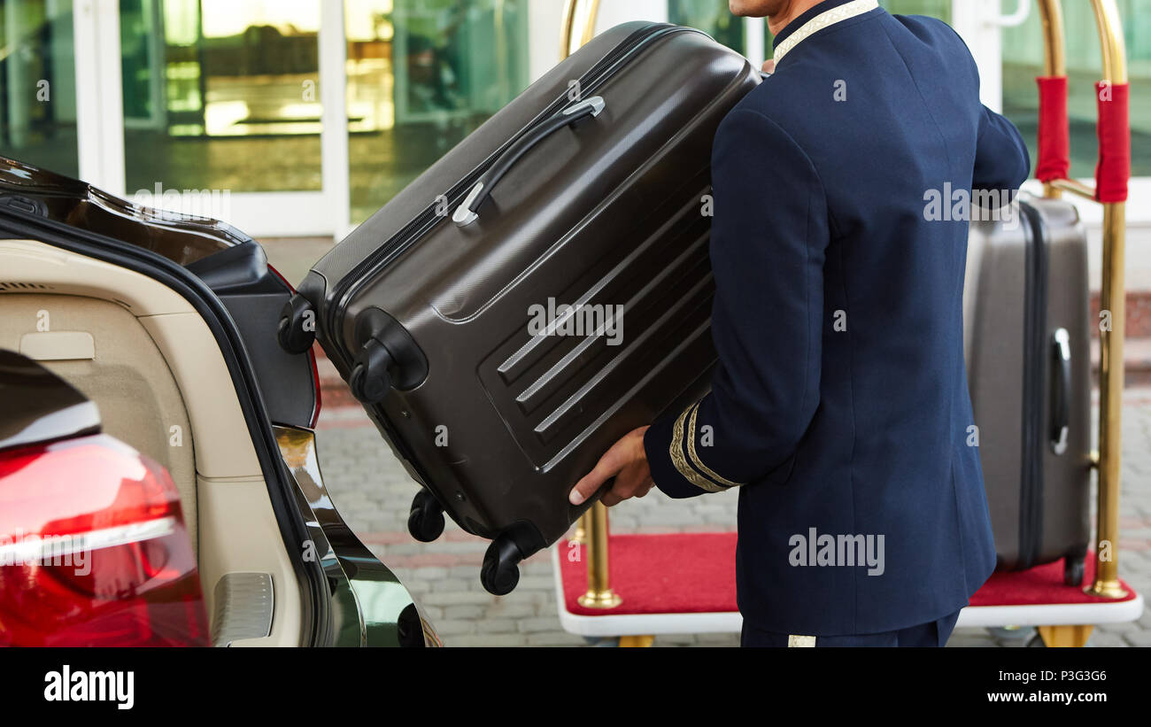 Hotel guest luggage staff hi-res stock photography and images - Alamy