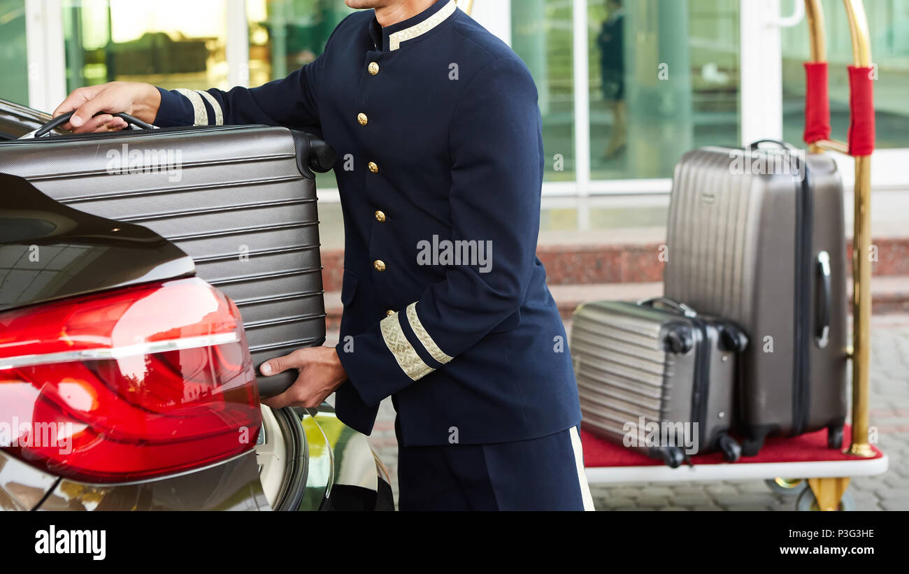 Hotel guest luggage staff hi-res stock photography and images - Alamy