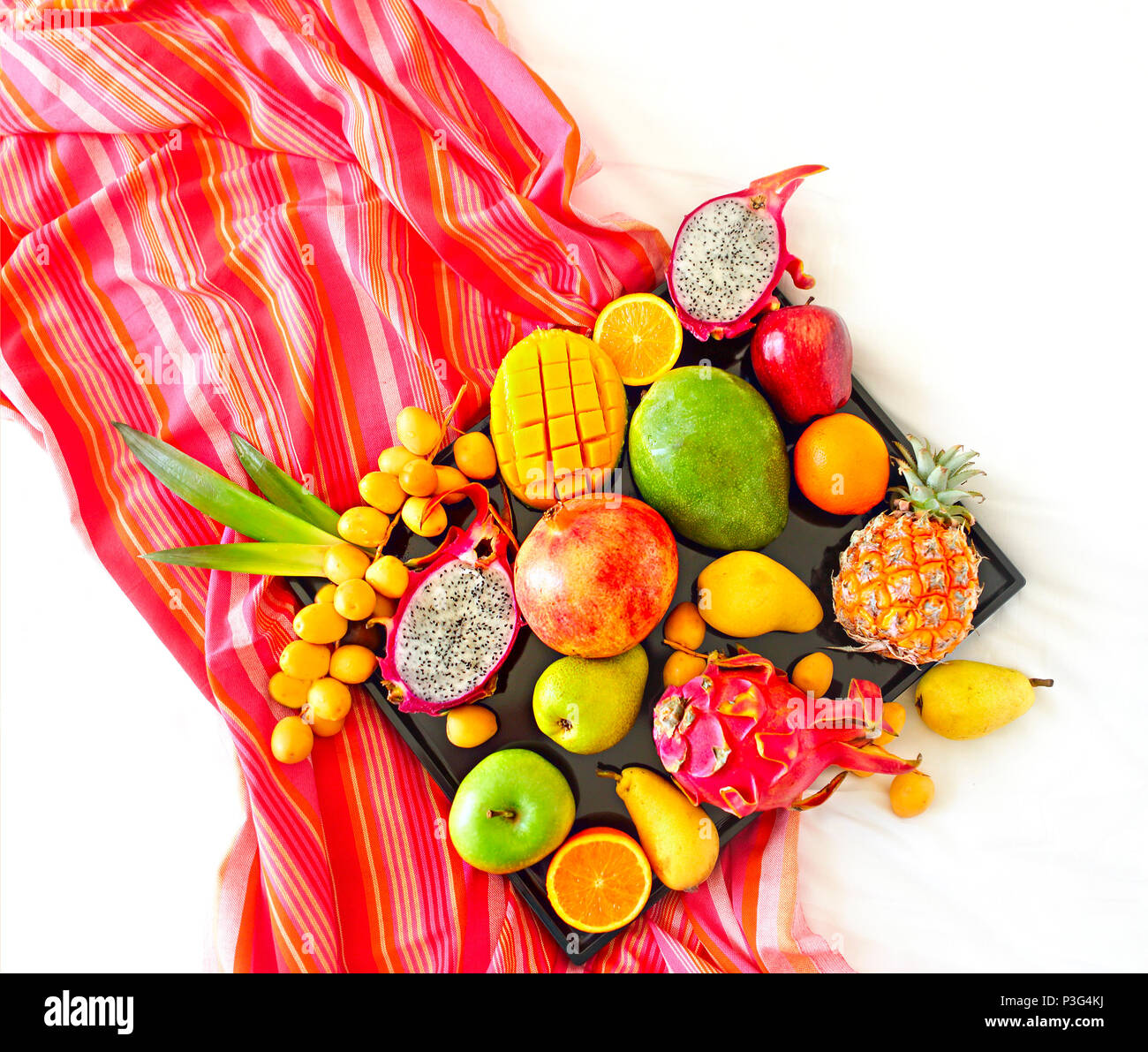 Exotic fruits on the tray. Close up Stock Photo Alamy