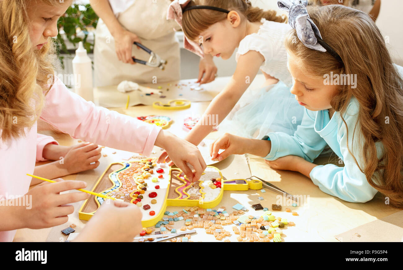 mosaic puzzle art for kids, children's creative game Stock Photo Alamy