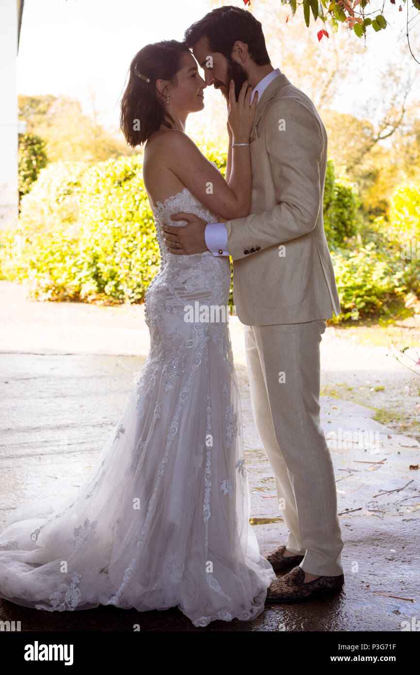Bride and groom looking into each others eyes Stock Photo
