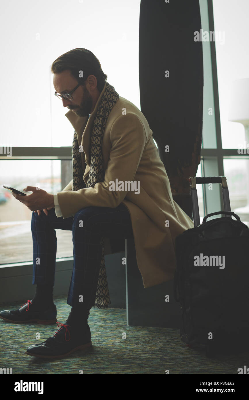 Businessman using mobile phone Stock Photo