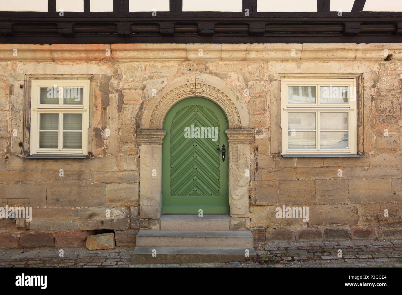 the old school of 1653 at Eisfeld, a town and a municipality in the district of Hildburghausen, in Thuringia, Germany Stock Photo