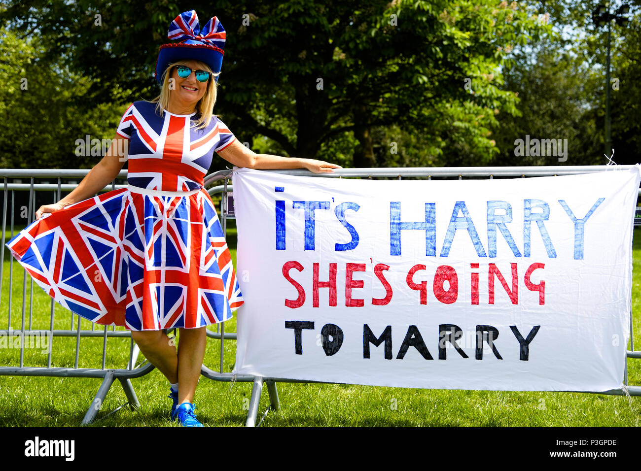 Pauline Jones Wearing A Union Jack Dress Poses Beside A Banner
