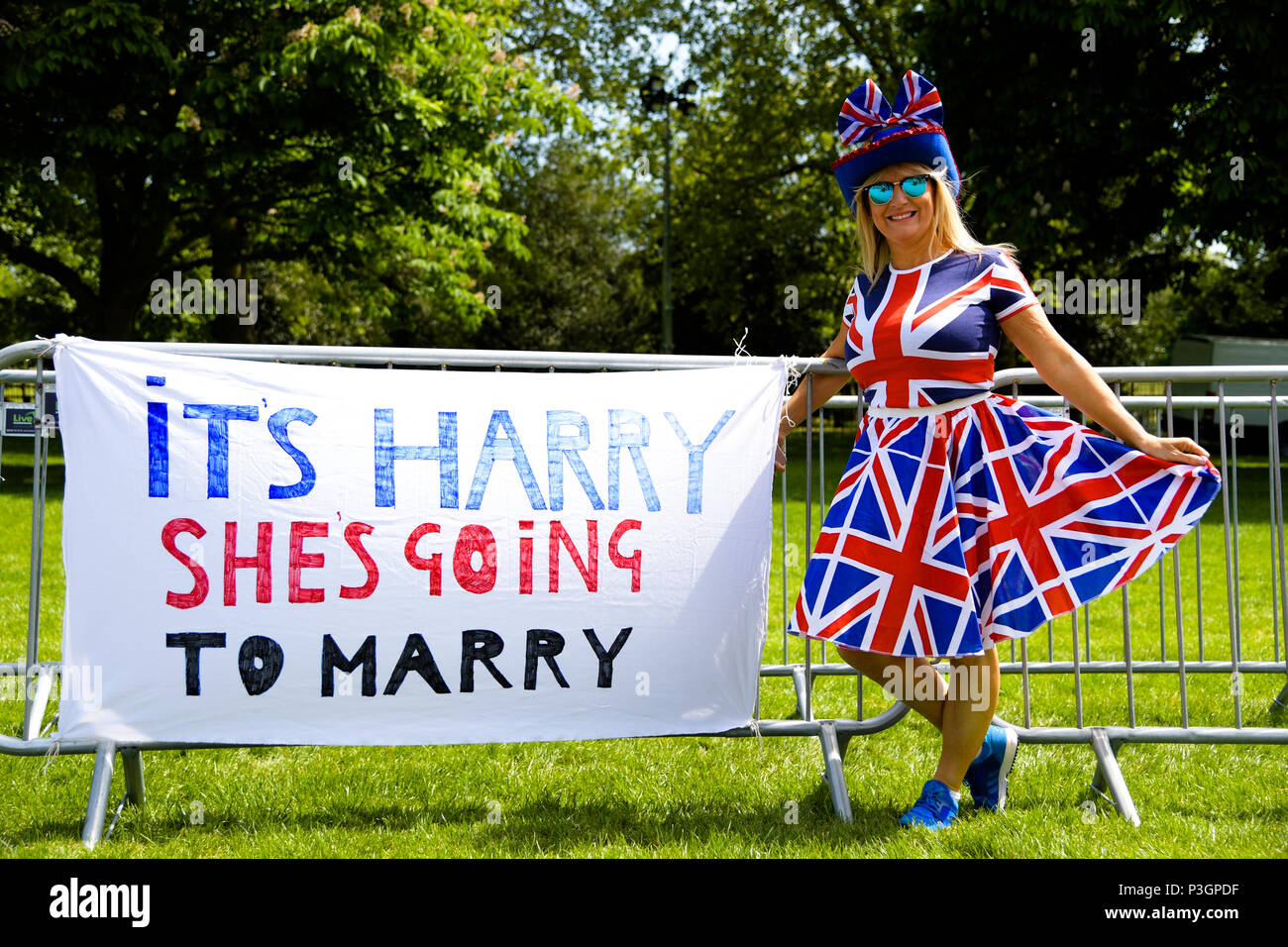 Pauline Jones Wearing A Union Jack Dress Poses Beside A Banner