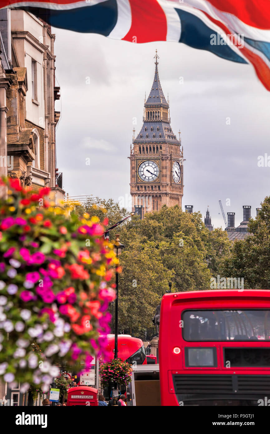 a routemaster red bus in front of big Ben in London England UK Stock Photo