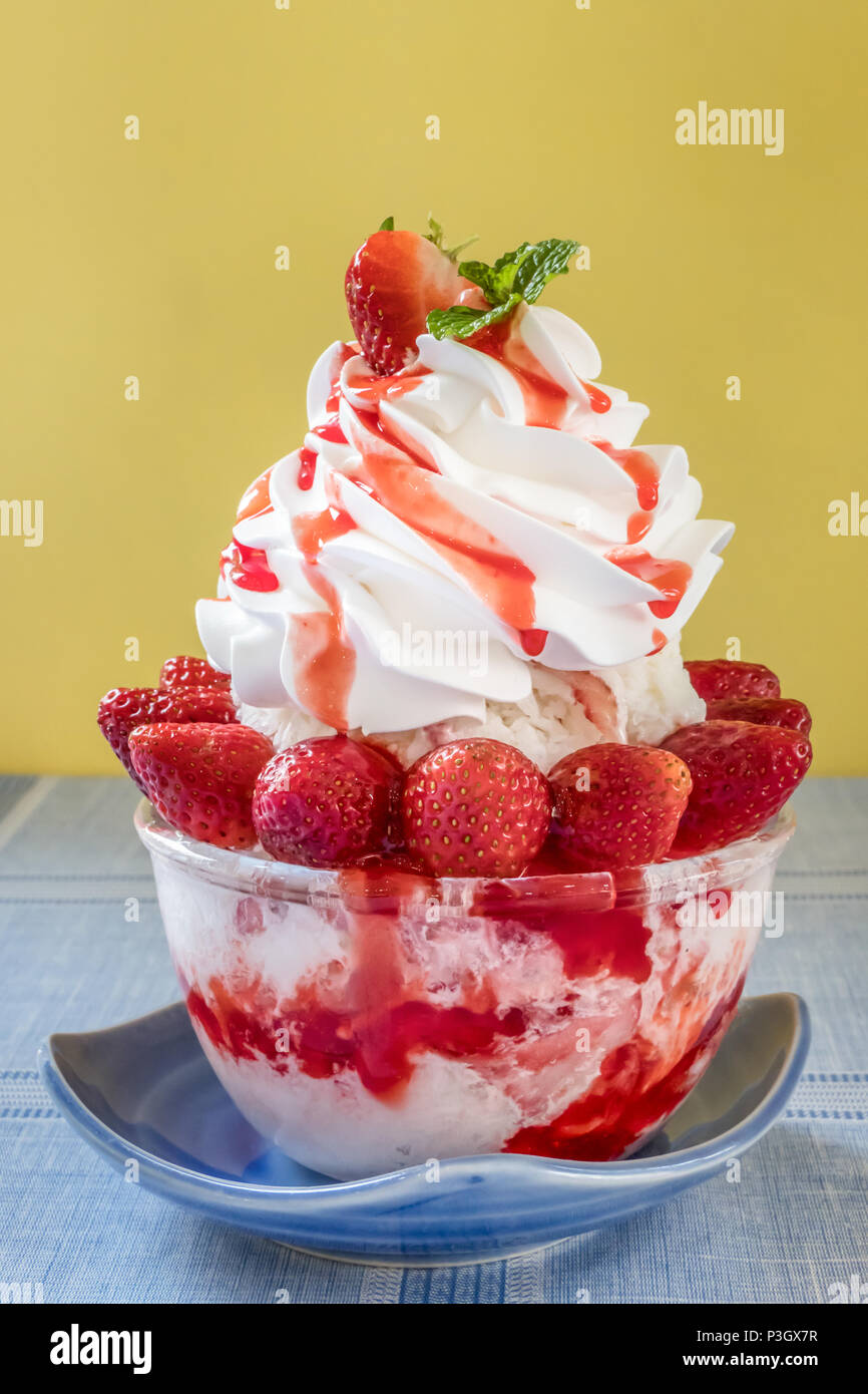 Bingsu Korean shaved ice dessert with sweet toppings with strawberry