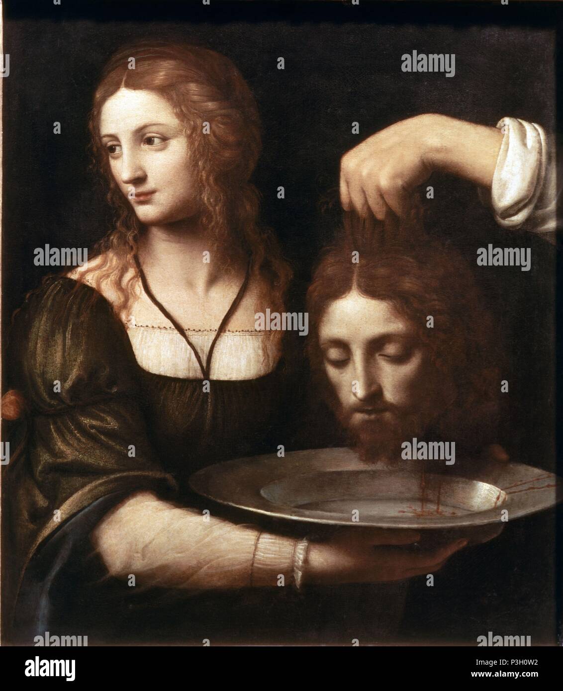 SALOME CON LA CABEZA DEL BAUTISTA. Author: Bernardino Luini (c. 1480-1532). Location: LOUVRE MUSEUM-PAINTINGS, FRANCE. Stock Photo
