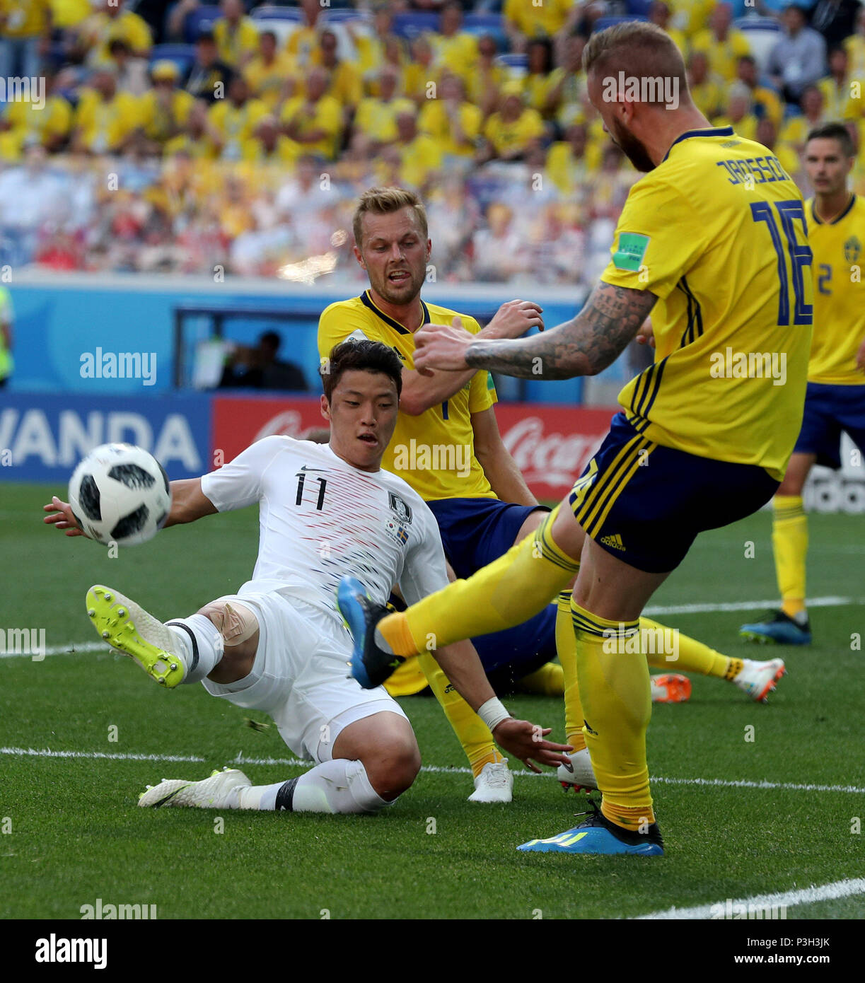 Nizhny Novgorod, Russia. 18th June, 2018. Hwang Heechan (L bottom) of South Korea vies with Pontus Jansson (R front) during a group F match between Sweden and South Korea at the 2018 FIFA World Cup in Nizhny Novgorod, Russia, June 18, 2018. Credit: Yang Lei/Xinhua/Alamy Live News Stock Photo