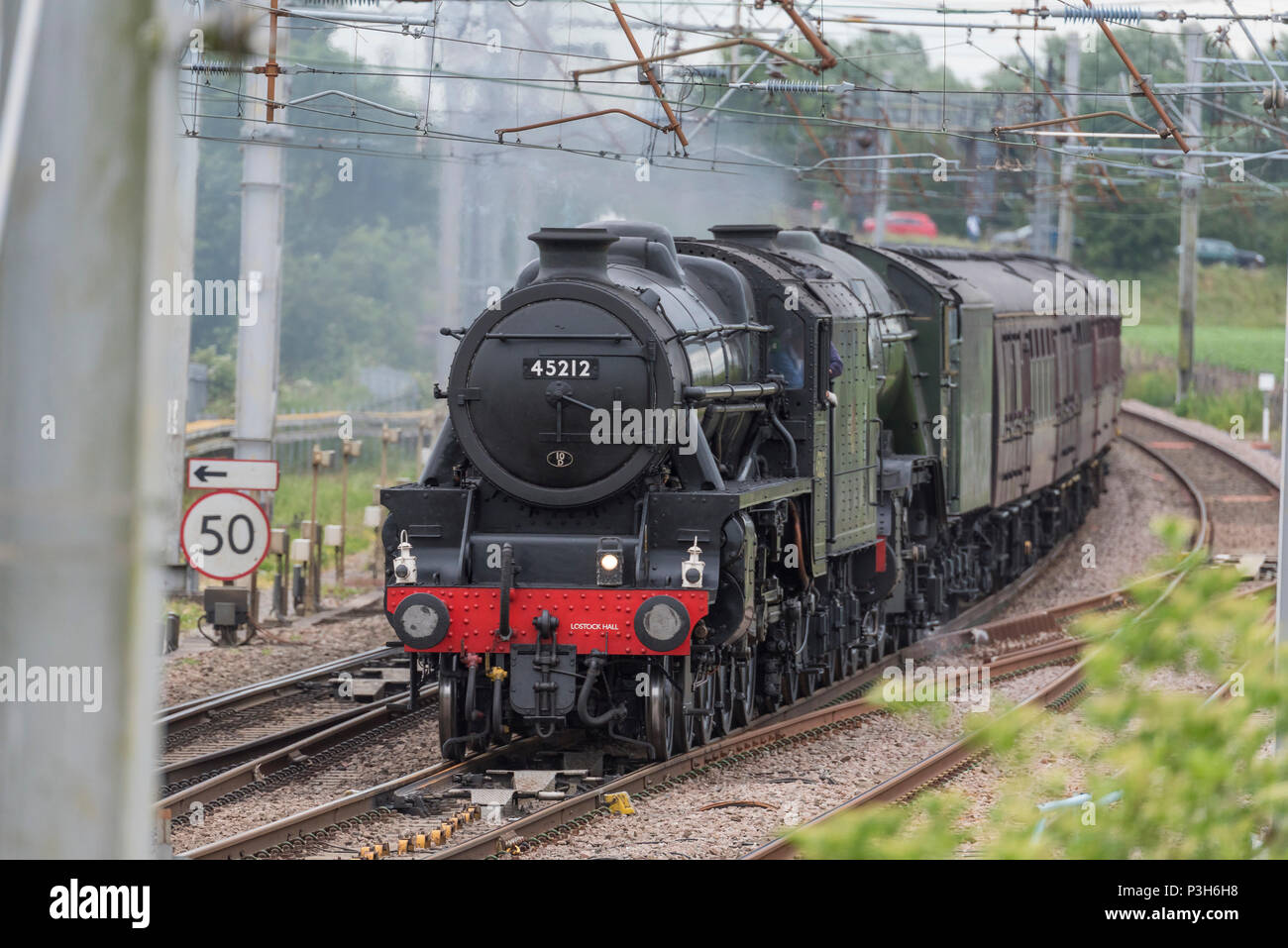 Winwick Cheshire United Kingdom.  18th June 2018. The world’s most famous steam locomotive, LNER A3 Class 4-6-2 no 60103 Flying Scotsman seen crossing Winwick Junction on the West Coast Main Line behind Stanier Black Five  LMS Class 5MT 4-6-0 no 45212 loco hauling day 1 of Steam Dreams railtour The Lakes Express. Credit: John Davidson Photos/Alamy Live News Stock Photo