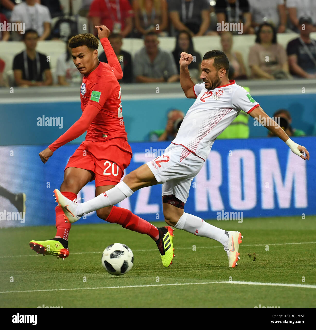 Volgograd, Russia. 18th June, 2018. Dele Alli (L) of England vies with Ali Maaloul of Tunisia during a group G match between Tunisia and England at the 2018 FIFA World Cup in Volgograd, Russia, June 18, 2018. Credit: Chen Cheng/Xinhua/Alamy Live News Stock Photo