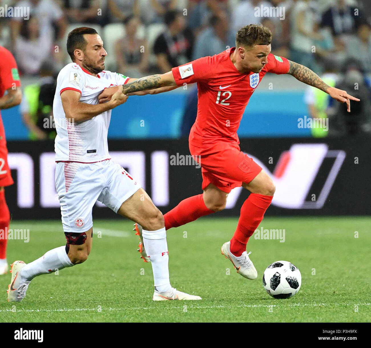 Volgograd, Russia. 18th June, 2018. Kieran Trippier (R) of England vies with Ali Maaloul of Tunisia during a group G match between Tunisia and England at the 2018 FIFA World Cup in Volgograd, Russia, June 18, 2018. Credit: Liu Dawei/Xinhua/Alamy Live News Stock Photo