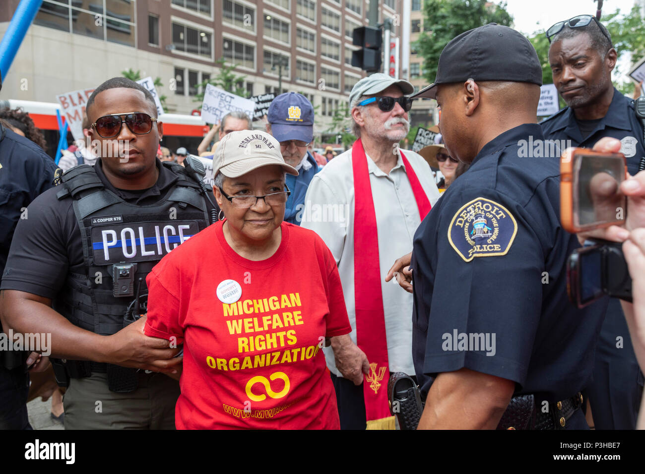 Detroit, Michigan USA - 18 June 2018 - Several hundred people rallied in Detroit to support the Poor Peoples Campaign against poverty, racism, militarism, and ecological devastation. A member of the Michigan Welfare Rights Organization was among two dozen arrested for blocking the QLine streetcar to highlight the need for better public transportation in Detroit. Credit: Jim West/Alamy Live News Stock Photo