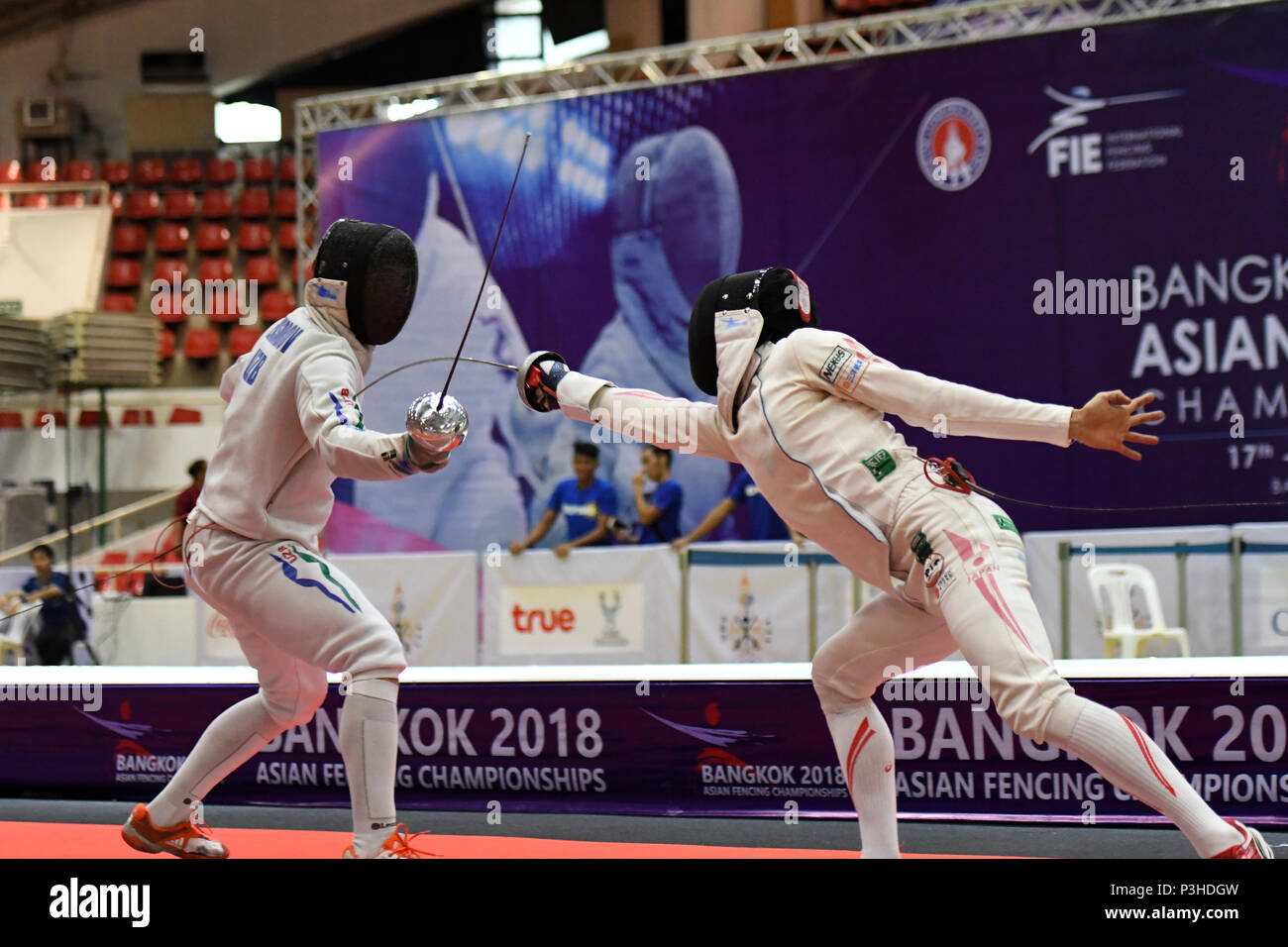 Koki Kano of Japan, right, fights against Roman Aleksandrov of