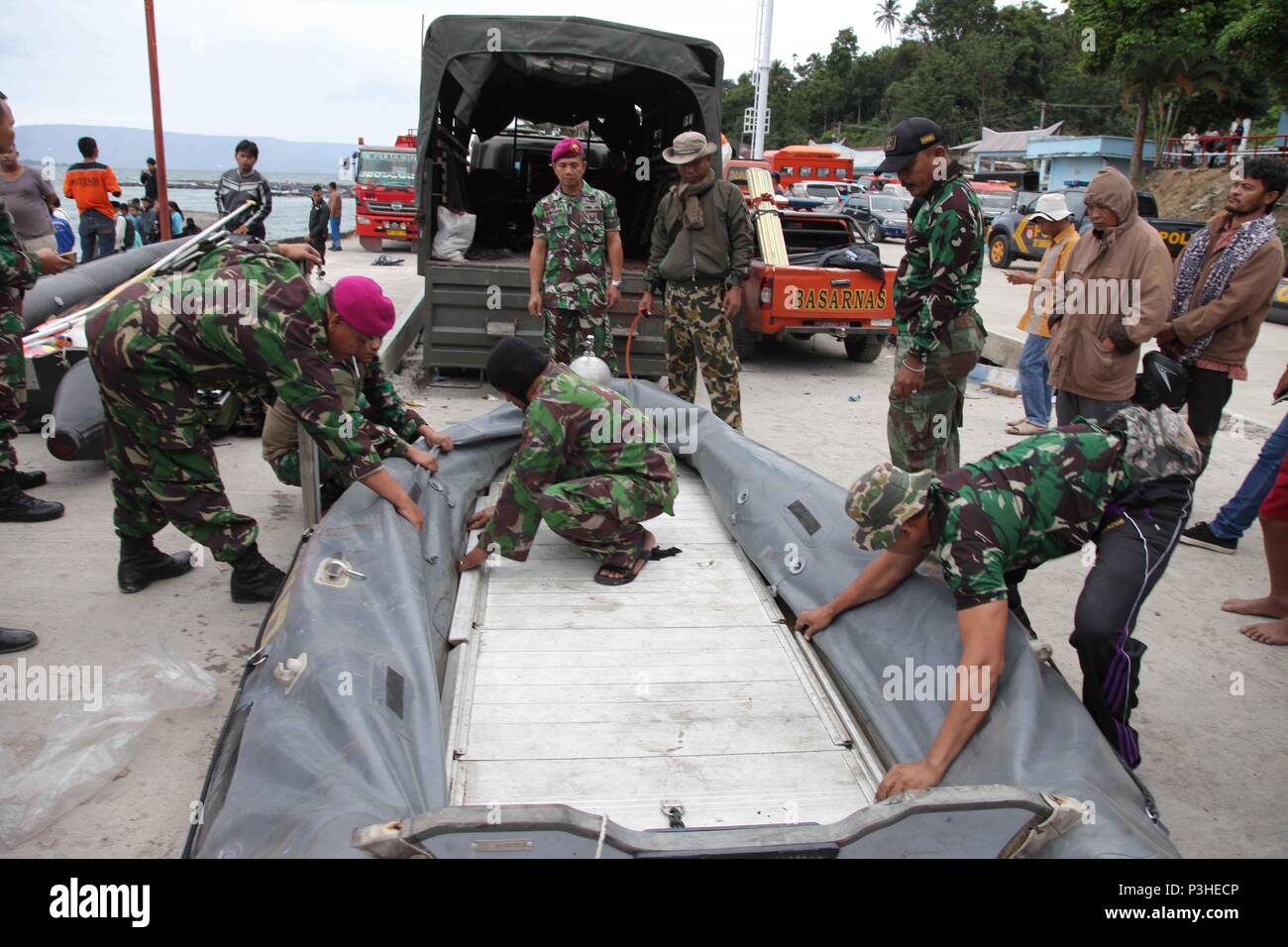 North Sumatera. 19th June, 2018. Indonesian marine soldiers prepare for a search and rescue operation for the sunken boat at Lake Toba in North Sumatera Province June 19, 2018. At least one holidaymaker was killed and dozens of others missing after a passenger boat sank in Lake Toba in North Sumatra on Monday. Credit: Albert Damanik/Xinhua/Alamy Live News Stock Photo