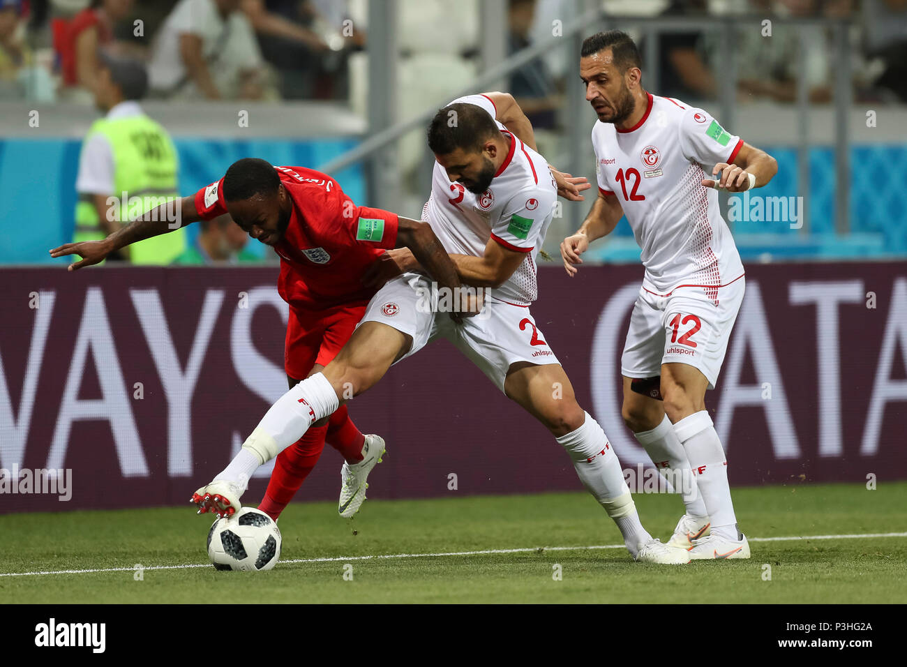 Volgograd, Russia. 18th June, 2018. Raheem Sterling of England, Syam Ben Youssef of Tunisia and Ali Maaloul of Tunisia during the 2018 FIFA World Cup Group G match between Tunisia and England at Volgograd Arena on June 18th 2018 in Volgograd, Russia.  Credit: PHC Images/Alamy Live News Stock Photo