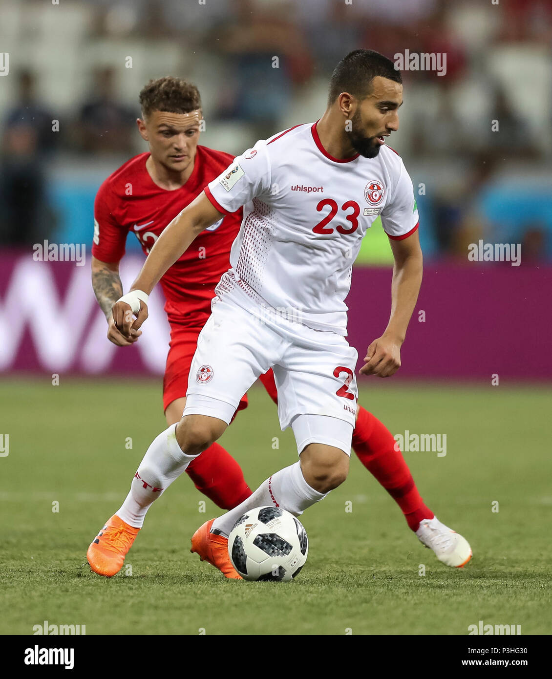 Volgograd, Russia. 18th June, 2018. Kieran Trippier of England and Naim Sliti of Tunisia during the 2018 FIFA World Cup Group G match between Tunisia and England at Volgograd Arena on June 18th 2018 in Volgograd, Russia.  Credit: PHC Images/Alamy Live News Stock Photo