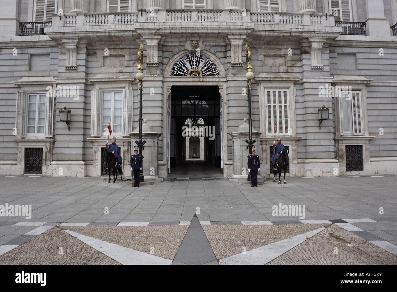 Spanish Royal Guards at the main entrance of the Palacio Real in Madrid. Stock Photo