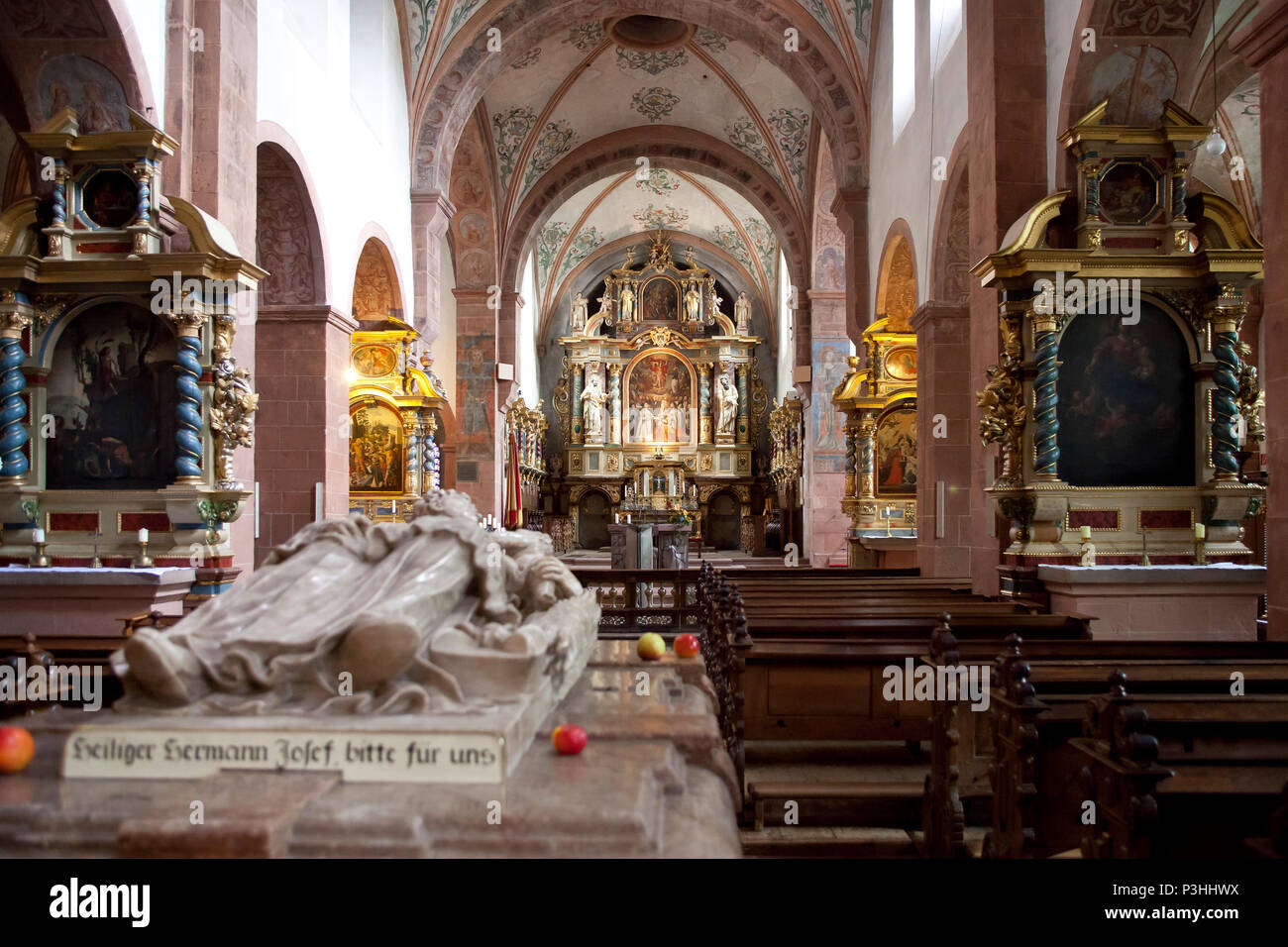 Germany, inside the basilica of Steinfeld Abbey in Kall in the Eifel region, nave with the sarcophagus of the saint Hermann Joseph.  Deutschland, in d Stock Photo