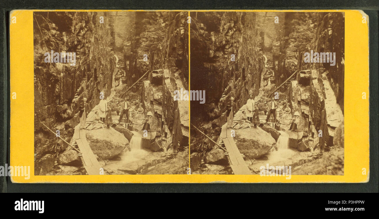 . Visitors at the Flume, 1868.  Coverage: 1864?-1880?. Source Imprint: Lincoln and New Hampton, N.H. : H.S. Fifield , 1864?-1880?. Digital item published 6-14-2006; updated 2-23-2010. 371 Visitors at the Flume, 1868, by H. S. Fifield Stock Photo