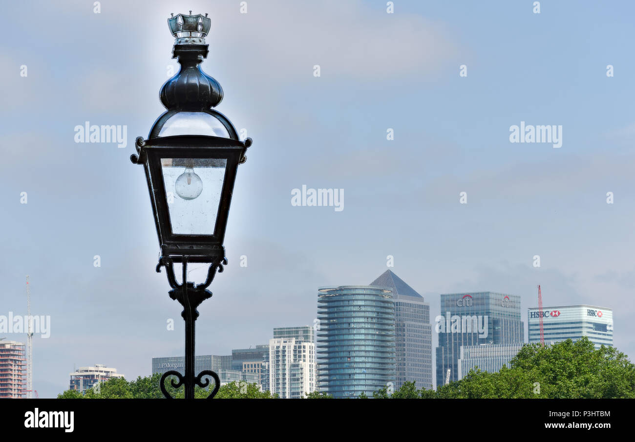 Modernised lamp at the royal naval college at Greenwich, London, England, looking out across the river Thames to the Isle of Dogs and Canary Wharf. Stock Photo