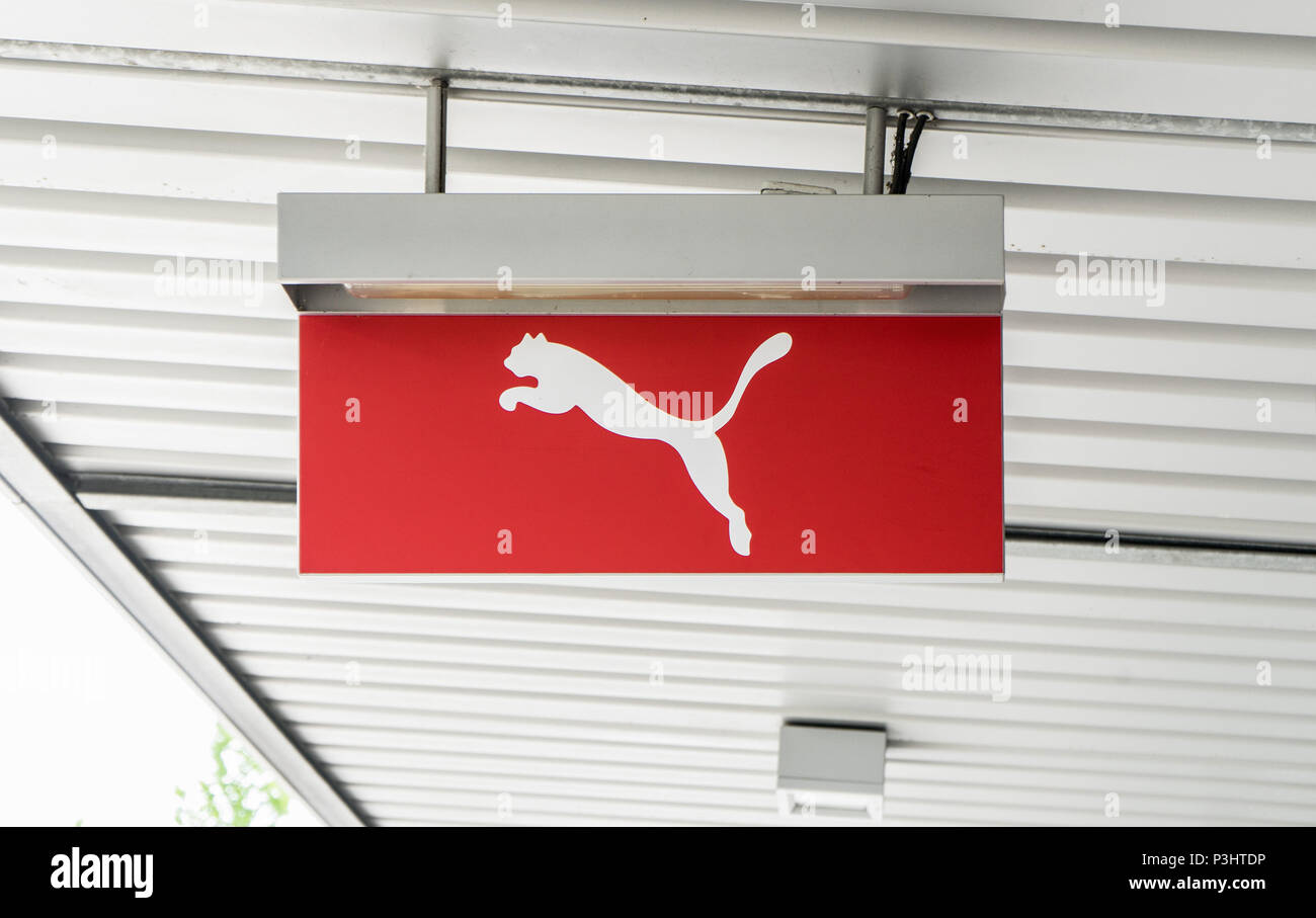 The Puma logo on the ceiling in front of a store in an outlet in Wolfsburg,  Germany, June 15, 2018 Stock Photo - Alamy