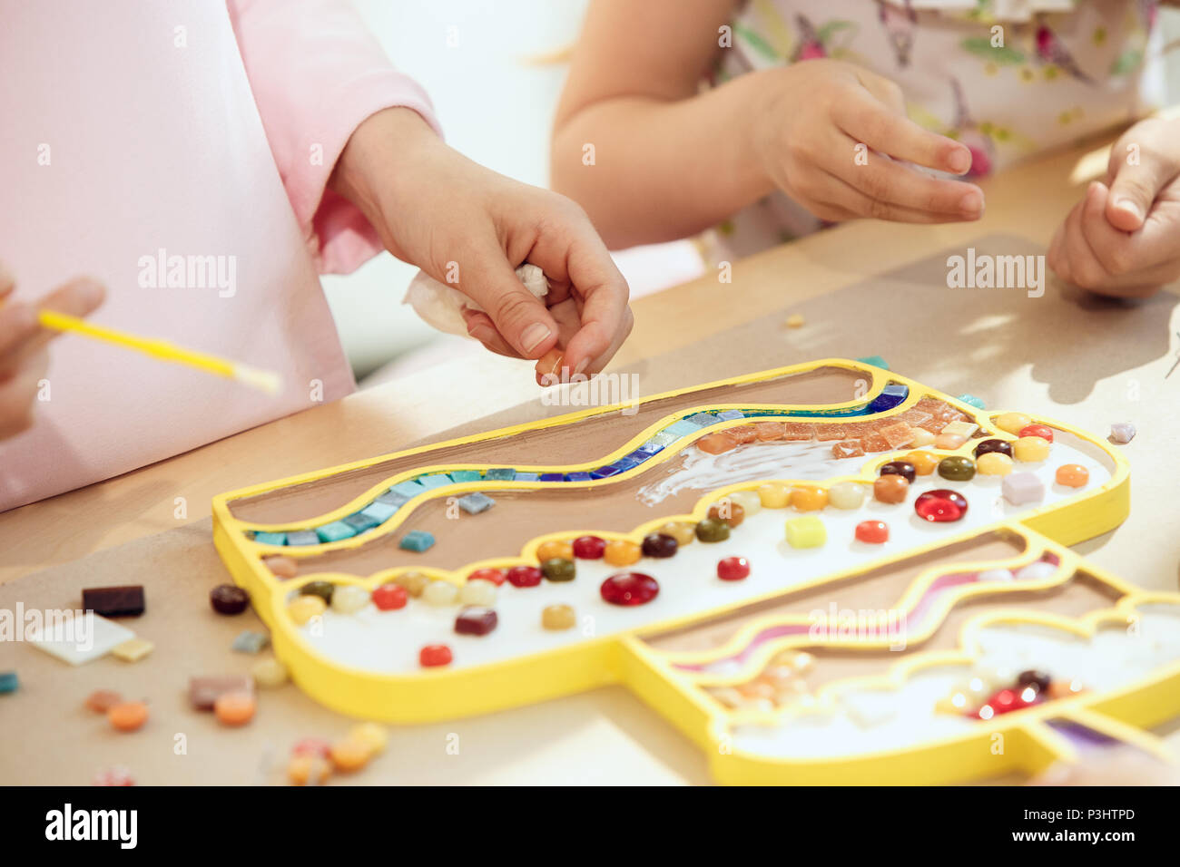 mosaic puzzle art for kids, children's creative game Stock Photo Alamy